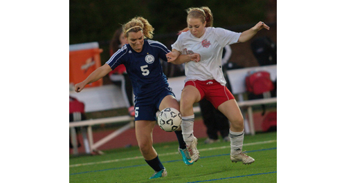 GARRET MEADE PHOTO | Stony Brook's Emma Lavery, left, and Southold/Greenport's Sophie Pickerell compete for the ball during the Suffolk County Class C final.