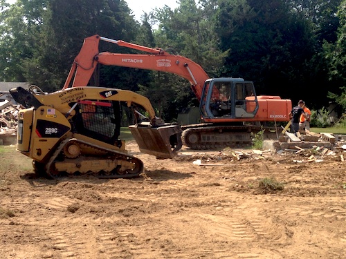 The World War II era Star Cabins in East Marion were demoed Friday morning. (Cyndi Murray photo)