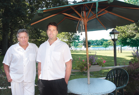 Ettore Pennachia, left, with son Brian, has been named Grand Marshal of the St. Patrick's Day Parade. (Credit: Suffolk Times, file)