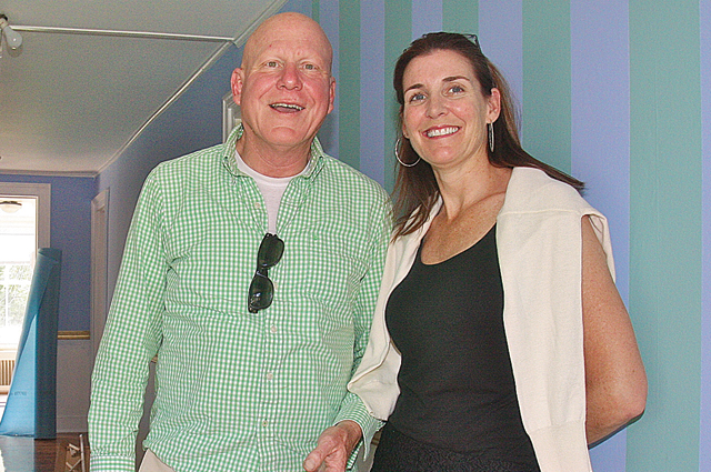 Designer Bob Tapp of Greenport and real estate agent Kate DiGregorio in the front hallway of the 1835 farmhouse. (Credit: Barbaraellen Koch, file)