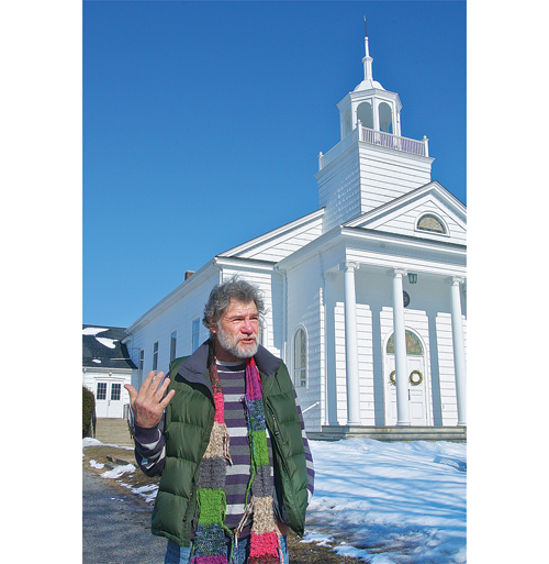 Artist Bob Kuhne, president of the Old Town Arts and Crafts Guild in Cutchogue, outside the Cutchogue church building the group hopes to purchase. (Credit: Barbaraellen Koch)