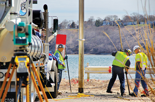Long Island Power Authority workers dig the intersection of Bay Shore Road and Island View Lane in Greenport. (Credit: Carrie Miller, file)