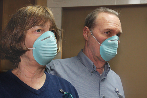 Laura Wilson and Thomas Lashinsky have been living in Holy Trinity Episcopal Church's rectory since December 2010. They've sued the church in state Supreme Court, claiming its leadership hasn't adequately addressed mold issues in the building. (Credit: Barbaraellen Koch)