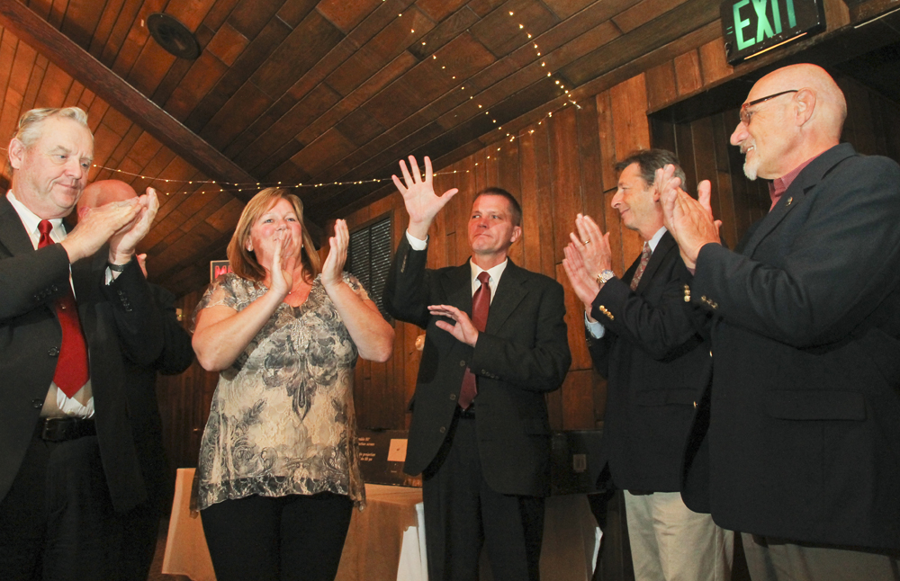 Town Supervisor Scott Russell waves to supporters Tuesday night. (Credit: Paul Squire)