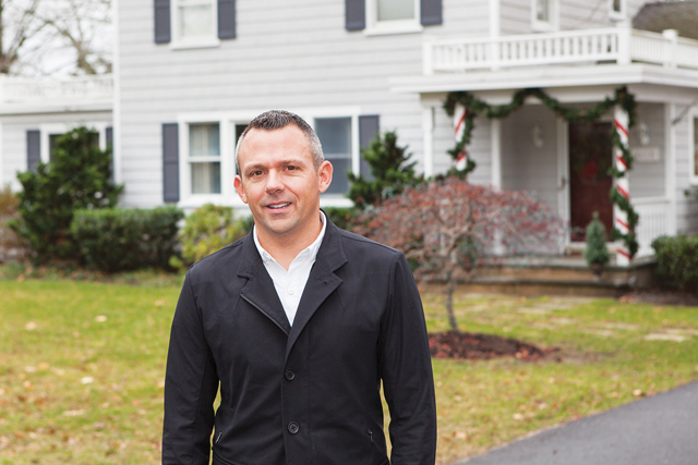 KATHARINE SCHROEDER PHOTORyan Springer in front of one of his listings.