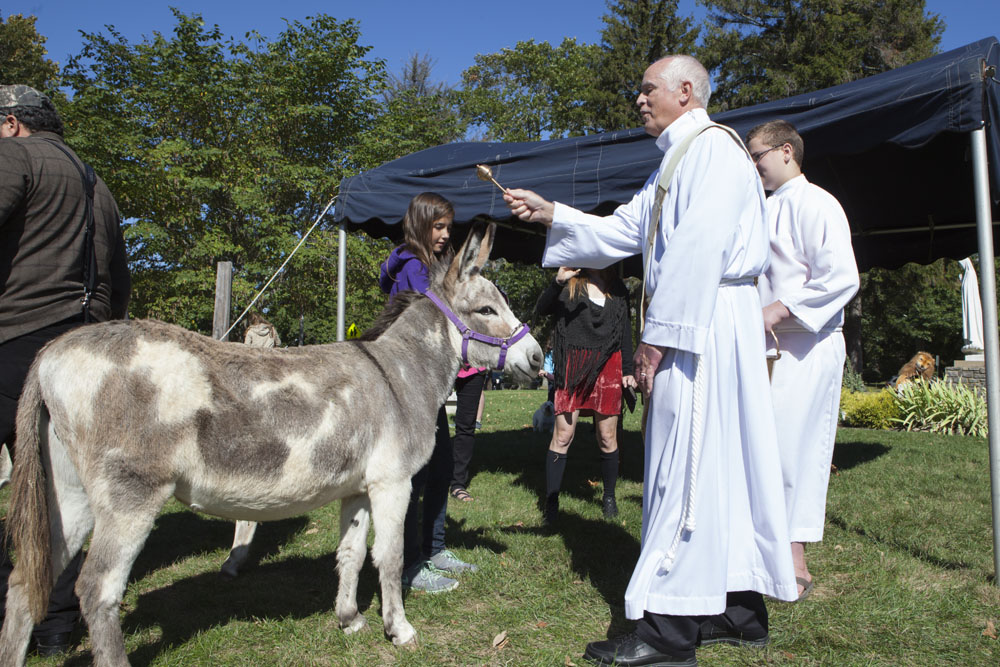 Christopher gets blessed.