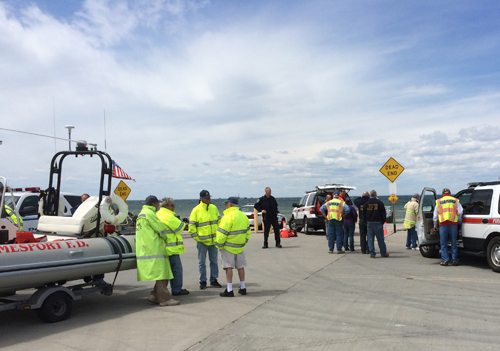 Emergency responders at Iron Pier Beach in Northville on Sunday. (Credit: Grant Parpan)