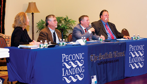 KATHARINE SCHROEDER PHOTO | Town board candidates debate winery regulation and deer management during Tuesday's forum. 