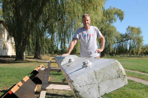 PAUL SQUIRE PHOTO | Dan Heston, the proud new owner of this 46-foot-tall flagpole, says he hopes to install the beam in the spring.