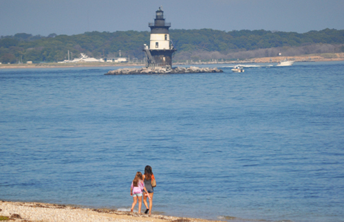 The scene at Orient Point Monday, soon after three men were rescued in Plum Gut Harbor, north of the Orient Point Lighthouse. (Credit: Grant Parpan)